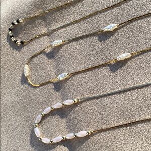 Three 1980s beaded necklaces.